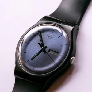 2010 Swatch SUOB702 BLACK REBEL Watch | Black Swatch New Gent Watch