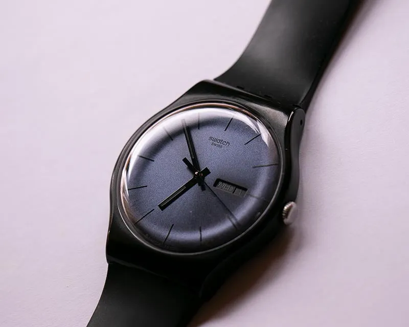 2010 Swatch SUOB702 BLACK REBEL Watch | Black Swatch New Gent Watch