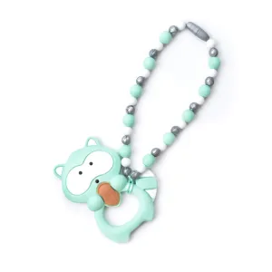 Mint Raccoon Baby Carrier Teether Toy