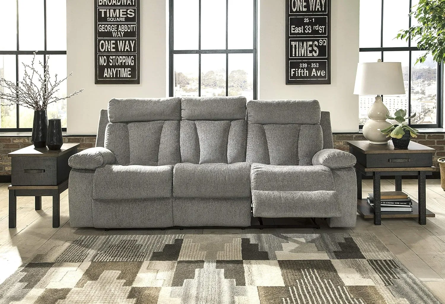 Signature Design by Ashley Mitchiner Contemporary Manual Reclining Sofa with Center Drop Down & Cup Holders, Gray